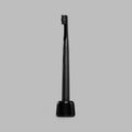 Matte-black sonic toothbrush standing upright on its charging base — BLACKVERSE