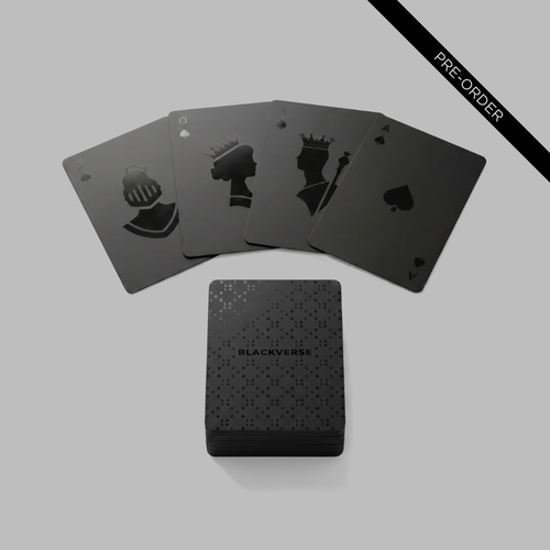 Black playing cards fanned out above a matte black deck box — BLACKVERSE