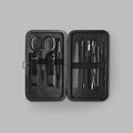 Black grooming kit open to reveal steel manicure tools in a leather case — BLACKVERSE