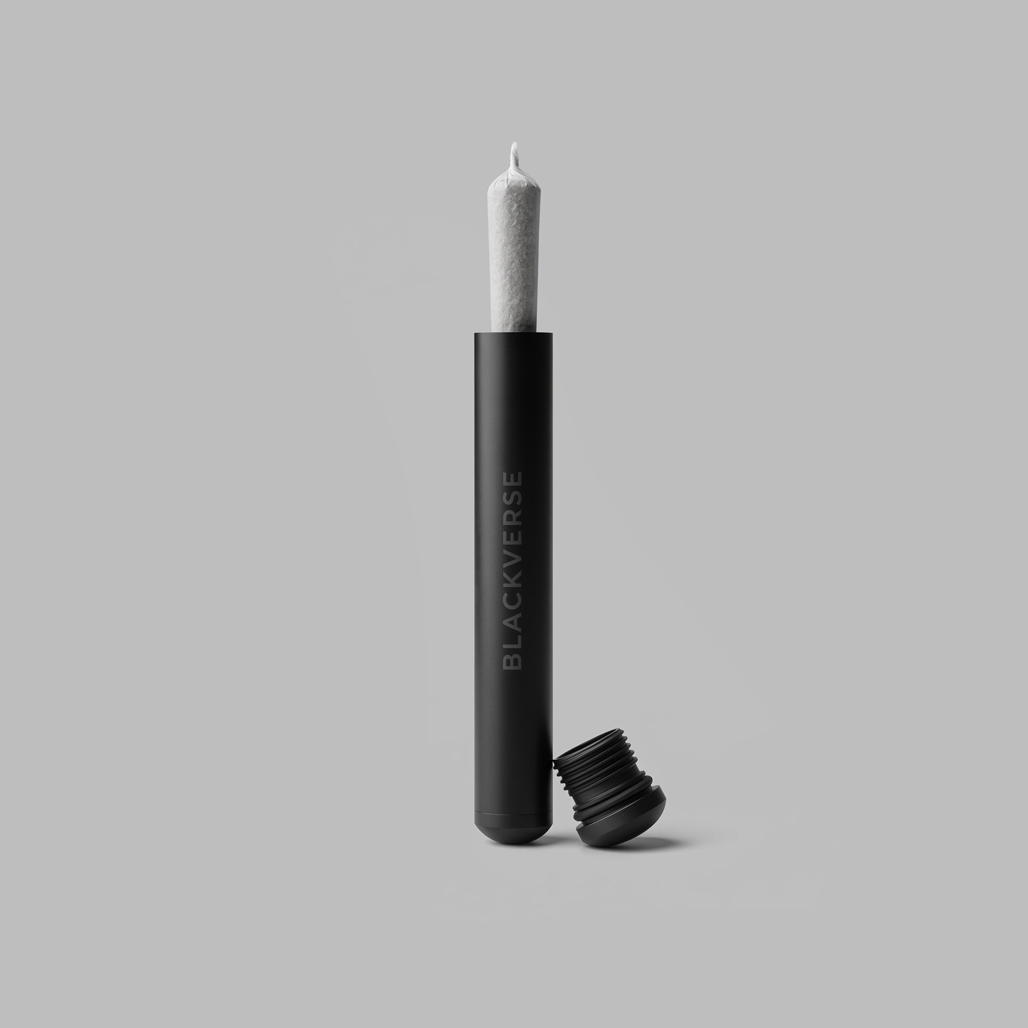 Slim black pre-roll holder, hero view on a dark surface — BLACKVERSE