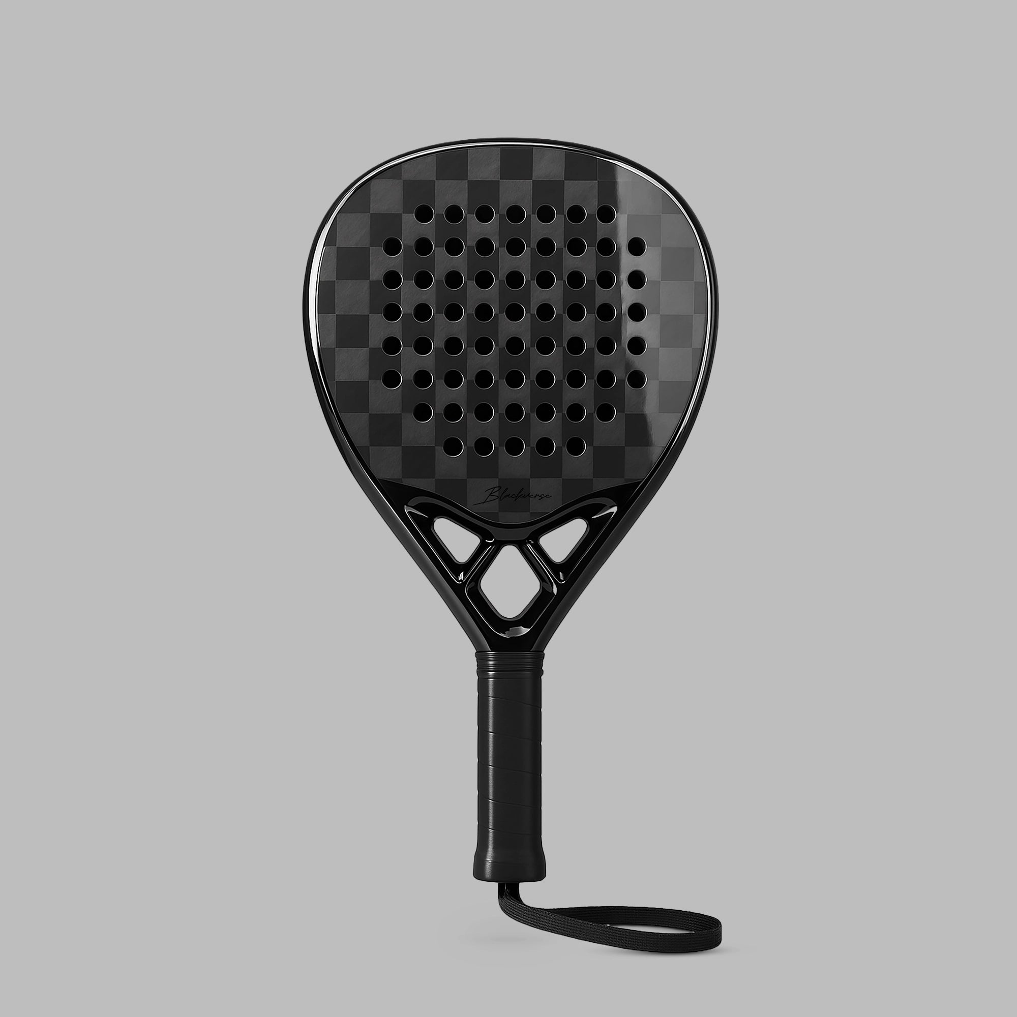 Black carbon-fiber paddle racket with a perforated face — BLACKVERSE